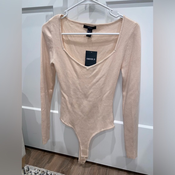 Long sleeve light pink bodysuit - Picture 1 of 2